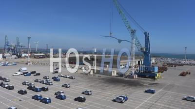 Parking Cars At The Container Terminal Of The Port - Video Drone Footage