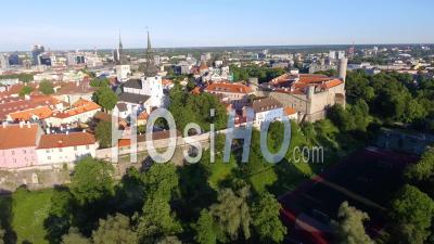 Tallinn Skyline At Sunset From Outside City Walls Estonia - Video Drone Footage