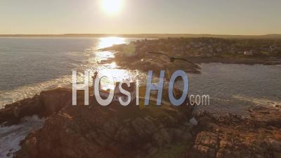Flying Low Around Nubble Lighthouse At Sunset. York Maine - Video Drone Footage