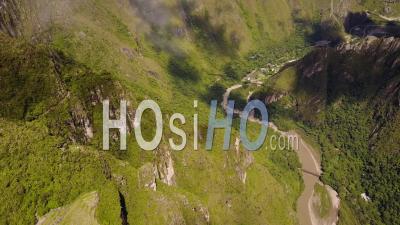 Machu Picchu Incan Citadel In The Andes Mountains Of Peru - Video Drone Footage