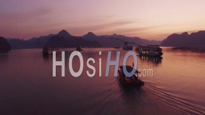 Sunset Over A Small Boat In Ha Long Bay Vietnam - Video Drone Footage