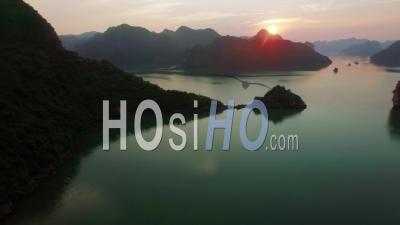 Sunset Above Lime Stone Island In Ha Long Bay Vietnam - Video Drone Footage