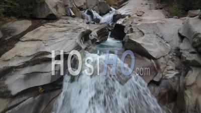 Whitewater Stream Winding And Eroding Rock In Fork River - Video Drone Footage