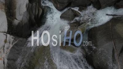 Whitewater Stream Winding And Eroding Rock In Fork River - Video Drone Footage