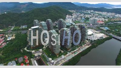 Modern Buildings Of 5-Star Hotels In Day Time In Sanya City, China - Video Drone Footage