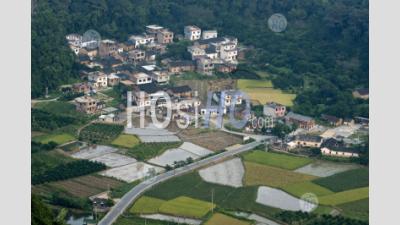 Village And Scenery Seen From The Top Of Moon Hill, Guangxi, China. - Aerial Photography