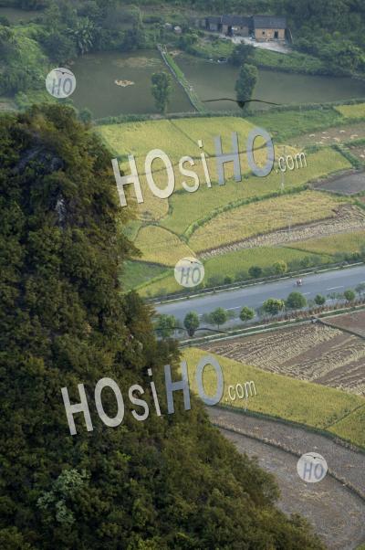China Guangxi Yangshuo Aerial View Of A Countryside Road And Rice Paddies From The Top Of The Moon Hill Limestone Peak - Aerial Photography