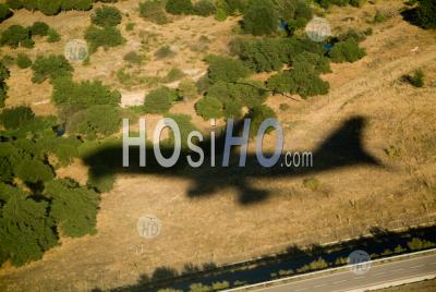 Shadow Of A Flying Airplane Taking Off - Aerial Photography