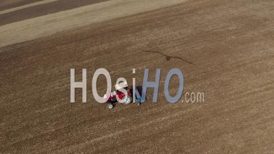 Video Drone Footage Of Tractor Plowing The Land