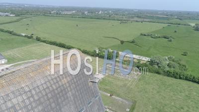 Aerial View Of An Airship Hangar In Ecausseville, Normandy, France - Video Drone Footage