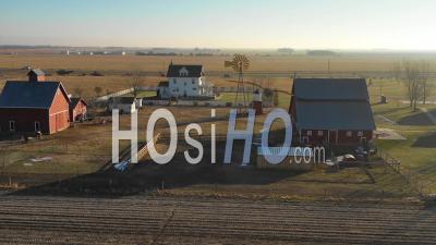 Aerial Video Drone Footage Of A Classic Farmhouse Farm And Barns In Rural Midwest America, York, Nebraska