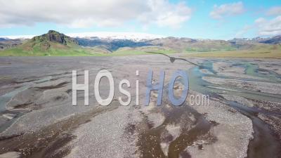 Aerial View Of The Outwash Pattern And Flow Of A Glacial River In A Remote Highland Region Of Iceland - Video Drone Footage