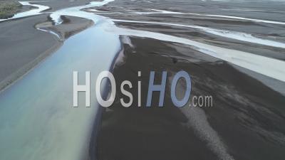 Aerial View Of The Outwash Pattern And Flow Of A Glacial River In A Remote Highland Region Of Iceland - Video Drone Footage