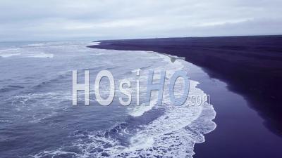 Aerial View Over A Black Sand Beach In Southern Iceland - Video Drone Footage