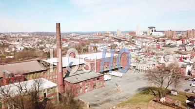 Aerial View Of An Abandoned American Factory With Smokestack Near Reading, Pennsylvania - Video Drone Footage