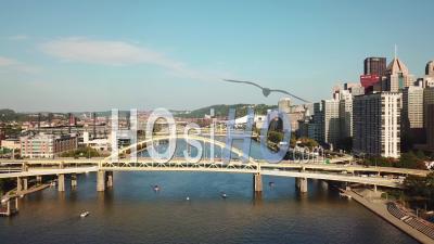 Aerial View Over Bridges On The Monongahela River To Pittsburgh, Pennsylvania Downtown Skyline - Video Drone Footage