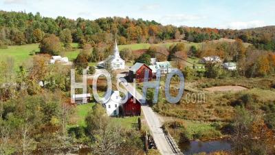 Aerial View Over A Charming Small Village Scene In Vermont With Church, Road And Farm - Video Drone Footage