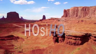 Aerial View Over A Cowboy On Horseback Overlooking Monument Valley, Utah - Video Drone Footage