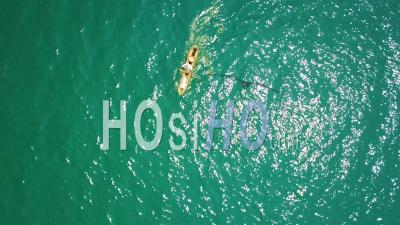 Aerial View A African Fishing Rowboat On Beautiful Green Waters Of The Ocean In Djibouti Or Somalia - Video Drone Footage