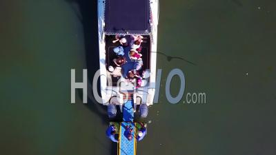 Aerial View Over A Small Dive Tour Boat Filled With Tourists Off The Coast Of Namibia - Video Drone Footage