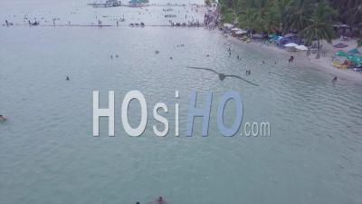 Aerial View Over The Boca Chica Beach District In The Dominican Republic - Video Drone Footage