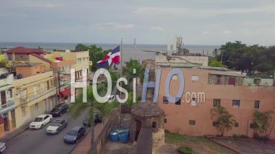 Aerial View Around The Flag Of The Dominican Republic In Santo Domingo - Video Drone Footage