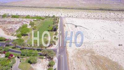 Aerial View Of Greenery And Desert Near Palm Springs California - Video Drone Footage