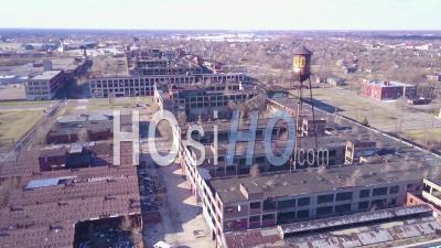 Aerial View Over The Ruined And Abandoned Packard Automobile Factory Near Detroit Michigan - Video Drone Footage
