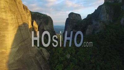 Aerial As Climbers Ascend A Sheer Pinnacle Spire In Meteora, Greece. - Video Drone Footage