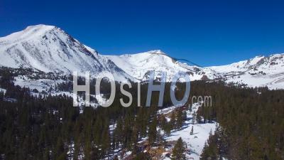 Aerial View Over A Remote Abandoned Cabin On A Mountaintop In The High Sierra Nevada Mountains In Winter - Video Drone Footage