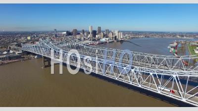 Aerial View Of The Crescent City Bridge Over The Mississippi River Revealing The New Orleans Louisiana Skyline - Video Drone Footage