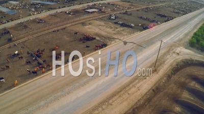 Aerial View Over The Pens At A Cattle Ranch And Slaughterhouse In Central California, United States Of America - Video Drone Footage