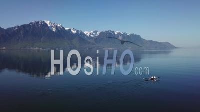 Two Rowers On Lake Geneva In The Morning - Video Drone Footage