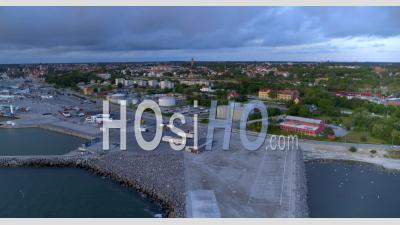 Aerial, View Over Harbor With City View In Background, Visby, Sweden - Video Drone Footage