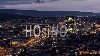 Establishing Aerial View Of Zurich At Night, Switzerland - Video Drone Footage