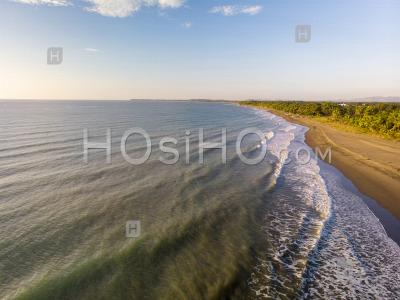 Sunset Over Beach With Mountain Background, Philippines, Drone View - Photographie Aérienne