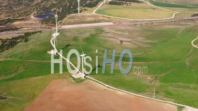  Aerial View Of (wide Shot) View Of Wind Turbine And Green Fields