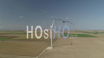 Rotating Wind Turbines And Wind Farm In Ile-De-France, Seine-Et-Marne, France, Video Drone Footage