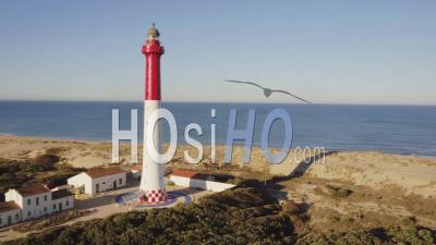 Turning Around La Coubre Lighthouse With Ocean Video Drone Footage