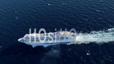 Circling Aerial View Of Cruise Ship,Camera Moves Across Bow Of Ship Right To Left