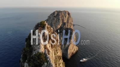 Faraglioni Rocks In Capri, At Sunset, Italy - Video Drone Footage