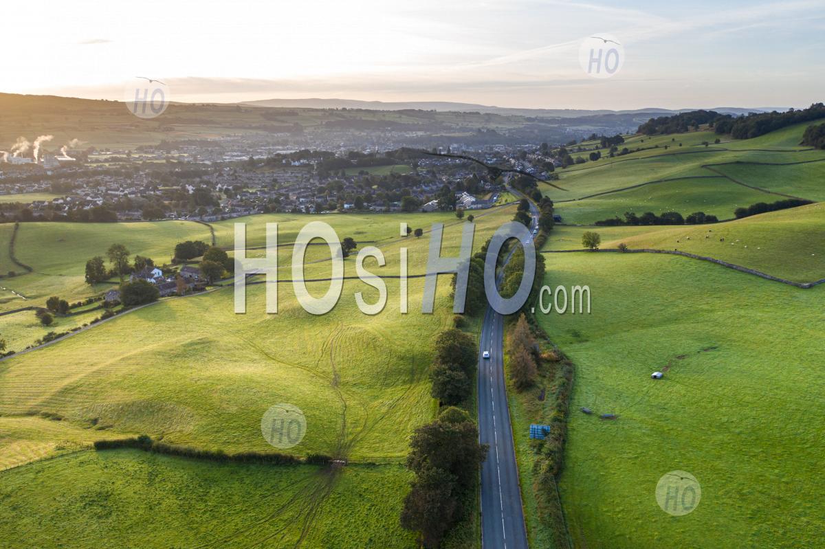 Rural Road Across Farming Fields At Sunrise - Aerial Photography