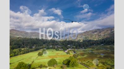 Aerial View Over Scenic Village In Lake District - Aerial Photography