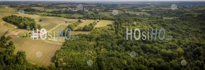 Aerial Of Flying Over A Beautiful Green Forest In A Rural Landscape - Aerial Photography