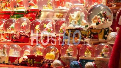 Row Of Small Snow Globes Santa Claus Sold In Christmas Market, Paris