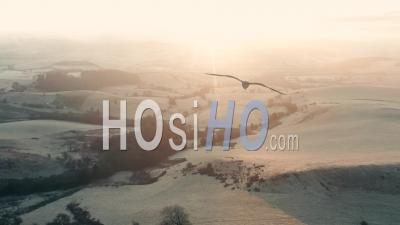 Rollling Hills Of British Countryside At Frosty Sunrise - Video Drone Footage