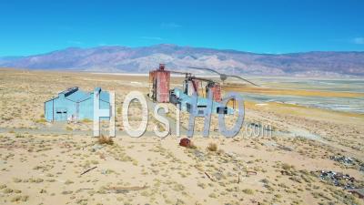 Aerial Video Over An Abandoned Glass Factory Plant Along Highway 395 At Owens Lake, Owens Valley, California - Video Drone Footage