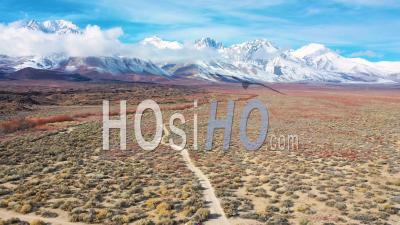 2020-Aerial Video Over Snow Covered Mountain In Eastern Sierras Near Bishop, California - Video Drone Footage