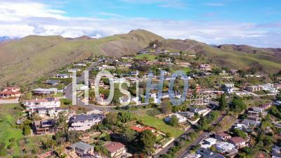 2020 - Aerial Video Over The Pacific Coastal Green Hills And Mountains Behind Ventura, California Including Suburban Homes And Neighborhoods - Video Drone Footage