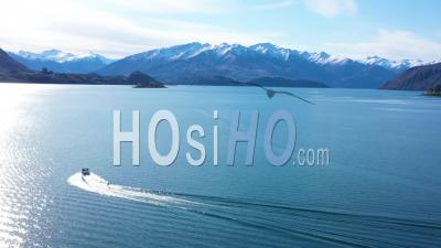2019 - A Water Skier Water Skiing On Lake Wakatipu On The South Island Of New Zealand - Aerial Video By Drone